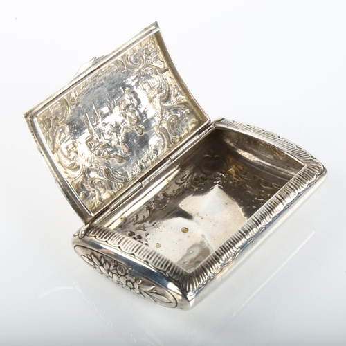 1370 - A Continental silver cushion snuffbox, relief embossed decoration, length 9.5cm, 2.9oz