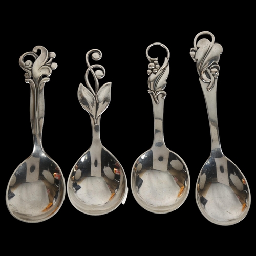 1373 - 4 Danish Art Deco silver preserve spoons, largest length 12cm, 1.8oz total (4)