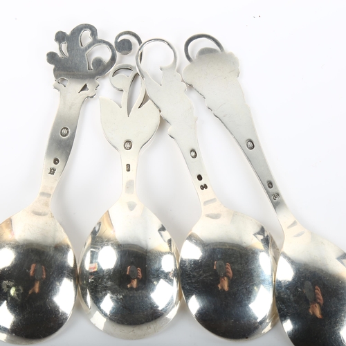 1373 - 4 Danish Art Deco silver preserve spoons, largest length 12cm, 1.8oz total (4)