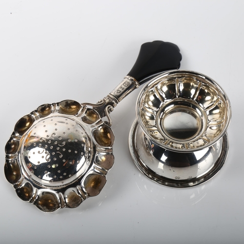 1379 - CARL M COHR - a Danish Art Deco silver and Bakelite tea strainer and stand, strainer length 15cm, 2.... 