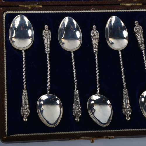 1392 - 2 cased sets of silver Apostle teaspoons and sugar tongs, including Sheffield 1905 and Birmingham 19... 