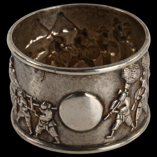 1400 - A Chinese export silver napkin ring, musical procession decoration, by Tuck Chang, circa 1900, diame... 