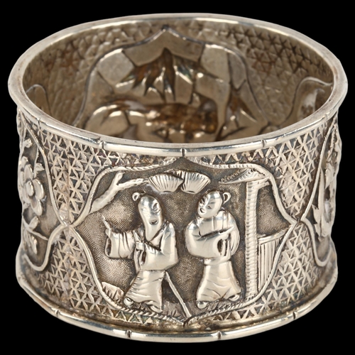 1401 - A Chinese export silver napkin ring, with aperture decoration, maker's marks WA, circa 1900, diamete... 