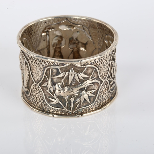 1401 - A Chinese export silver napkin ring, with aperture decoration, maker's marks WA, circa 1900, diamete... 