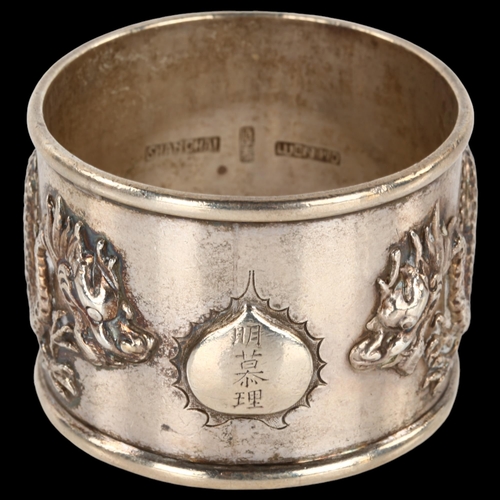 1402 - A heavy Chinese export silver dragon napkin ring, by Luen Wo, Shanghai circa 1900, diameter 5cm, 1.9... 