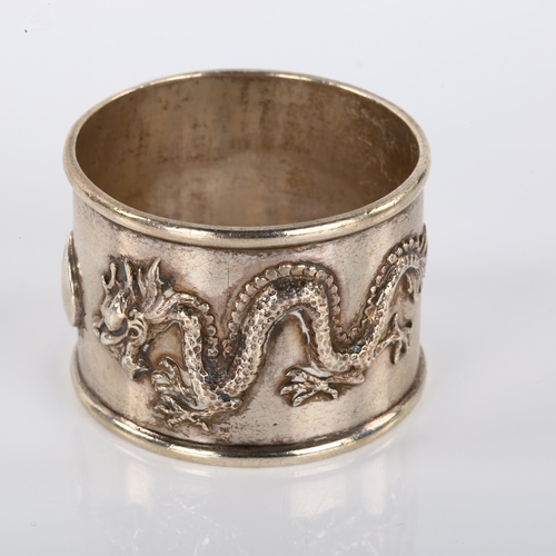 1402 - A heavy Chinese export silver dragon napkin ring, by Luen Wo, Shanghai circa 1900, diameter 5cm, 1.9... 