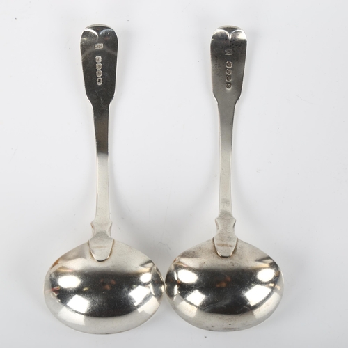 1417 - A pair of George III silver Fiddle pattern sauce ladles, with engraved Bishop's armorial crest, by T... 