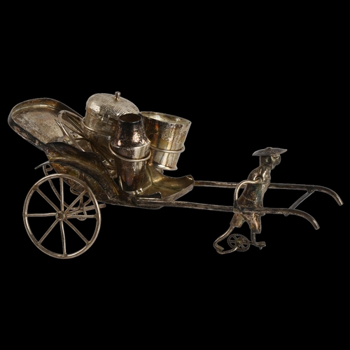 1422 - A Chinese white metal rickshaw cruet set, circa 1920, length 20cm (1 wheel detached)