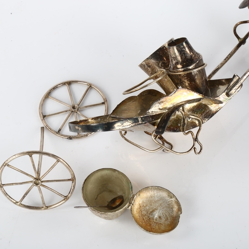 1422 - A Chinese white metal rickshaw cruet set, circa 1920, length 20cm (1 wheel detached)