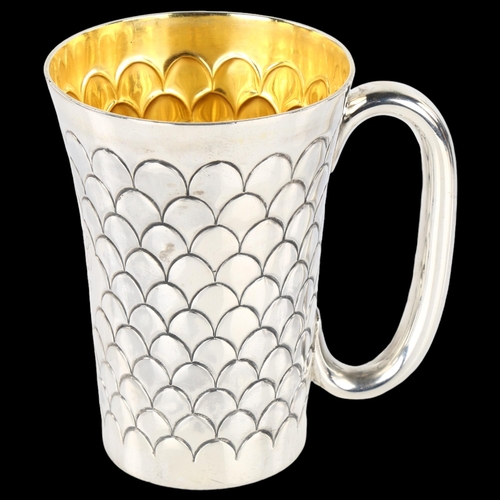 1423 - A Victorian silver mug, tapered cylindrical form with scale decoration and gilt interior, by Martin,... 