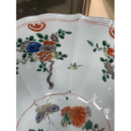 221 - A Chinese white glaze porcelain lotus flower design bowl, with painted butterflies and flowers, diam... 