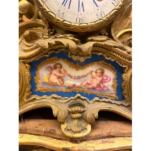 162 - An early 19th century gilt-bronze cased mantel clock by Raingo Frere Paris, Rococo style case surmou... 
