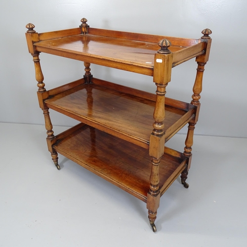 2526 - A Victorian mahogany three-tier buffet, raised on brass casters. 93x105x48cm