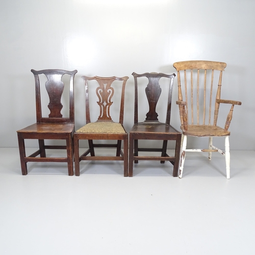 2552 - A Victorian elm-seated kitchen armchair, two antique mahogany spat back dining chairs, and another d... 