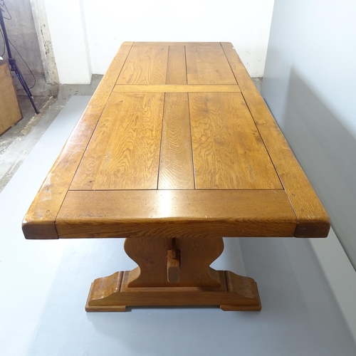 2553 - A light oak refectory dining table. 220x76x91cm