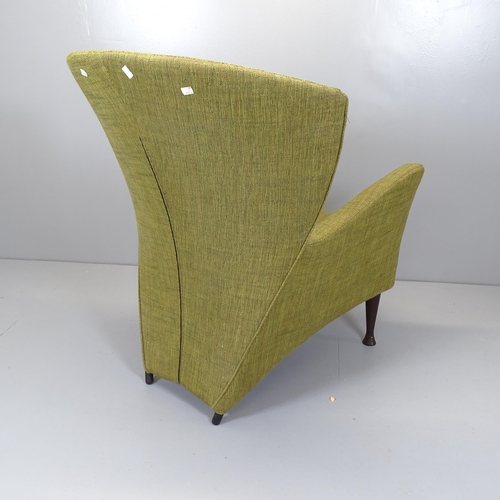 2556 - A mid-century style wingback armchair