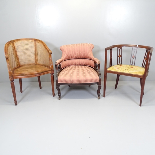 2559 - An oak framed bergere tub chair, A Victorian bow arm chair and another (3)