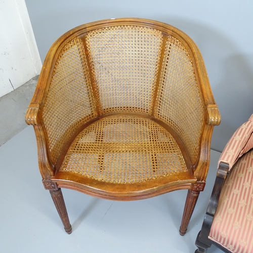 2559 - An oak framed bergere tub chair, A Victorian bow arm chair and another (3)