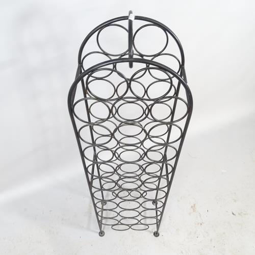 2566 - A modern painted metal 31 bottle wine rack. 32x120x19cm