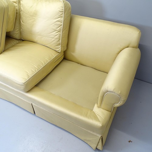 2533 - A contemporary three-seater Chesterfield style sofa, upholstered in champagne coloured dupion silk, ... 