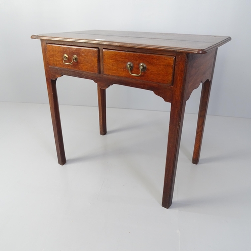 2047 - A George II oak lowboy writing table, with 2 drawers. 81 x 72 x 49cm.