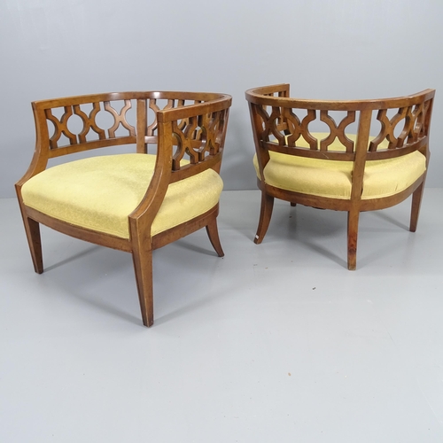 2057 - A pair of American Hollywood Regency tub lounge chairs in the manner of Dorothy Draper.