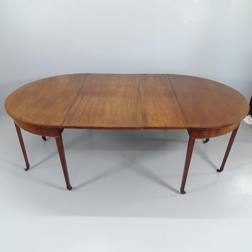 2059 - A Georgian mahogany D-end dining table with two spare leaves. Fully extended 222x73x125cm