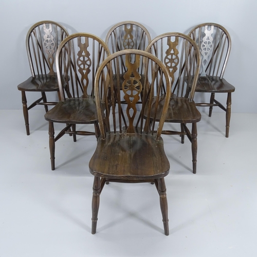 2060 - A set of six elm-seated wheelback dining chairs.