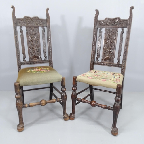 2078 - A pair of 19th century carved oak and tapestry upholstered hall chairs.