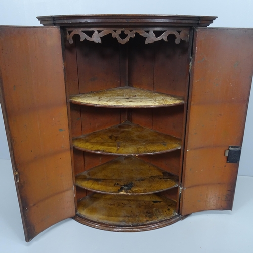 2081 - A 19th century mahogany hanging corner cupboard. 72x96x48cm