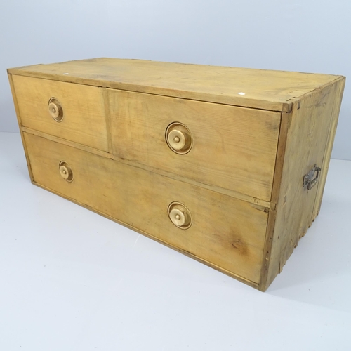 2086 - A vintage pine campaign style low chest of two short and one long drawer. 122x55x55cm