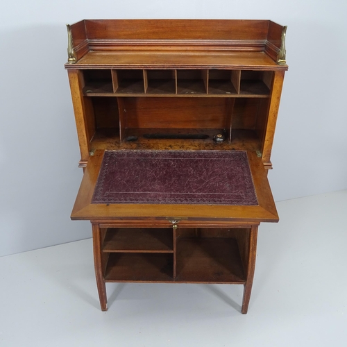 2088 - A Victorian walnut Aesthetic writing cabinet, the fitted fall front over single drawer with lower ta... 