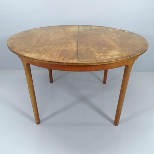 2094 - A mid-century teak Mcintosh draw-leaf dining table, with makers label. 122 (extending to 212cm)x74x1... 