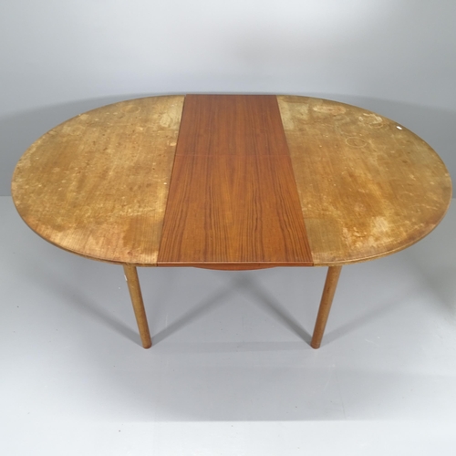 2094 - A mid-century teak Mcintosh draw-leaf dining table, with makers label. 122 (extending to 212cm)x74x1... 