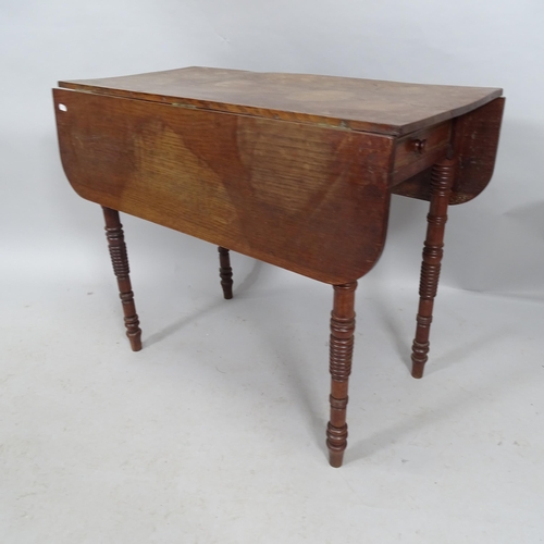 2167 - A Victorian mahogany dropleaf Pembroke table, with end frieze drawer, raised on turned legs. 87x73x4... 