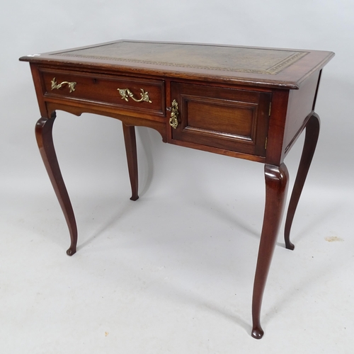 2192 - An Edwardian ladies' writing desk with inset tooled and embossed green leather skiver, fitted drawer... 