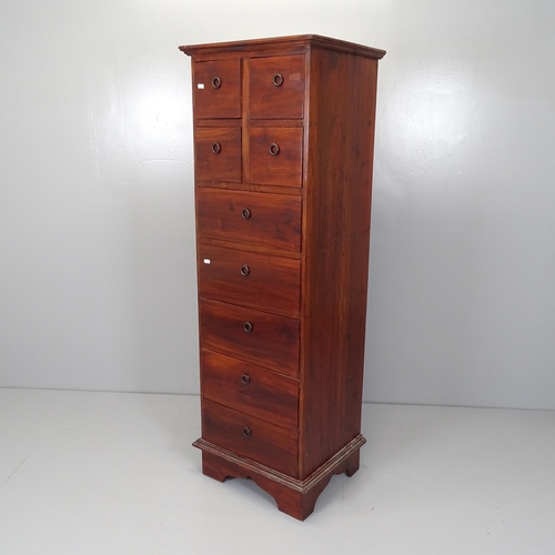 2579 - A modern tall mahogany chest of four short and five long drawers. 50x150x41cm