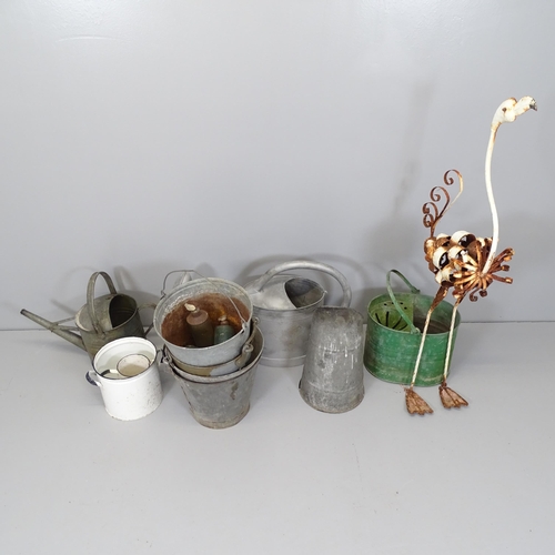 2585 - Various galvanised and painted metal items including two watering cans, three buckets, flamingo scul... 