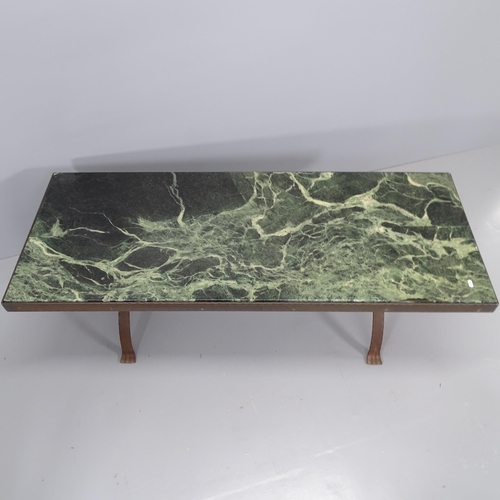 2166 - A marble-topped coffee table on cast iron base.148x52x58cm