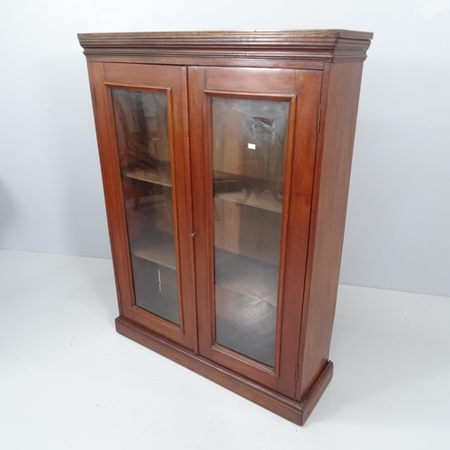 2170 - A Victorian mahogany bookcase with two glazed doors and two adjustable shelves. 88x118x26cm