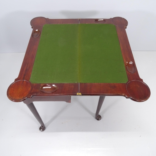 2171 - A George II foldover card table, raised on tapered legs with spade feet. 84x73x42cm