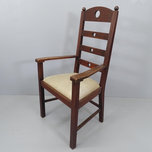 2182 - An Arts & Crafts oak ladder back armchair with heart and circle cut-outs.