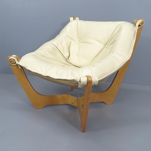 2186 - A contemporary laminate and beige leather upholstered Luna tub chair in the manner of Odd Knutsen.