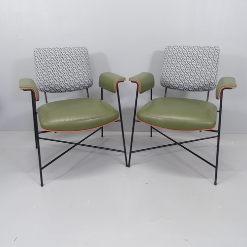 2187 - A pair of mid-century style lounge chairs with leather upholstered seats and arms, and fabric back, ... 