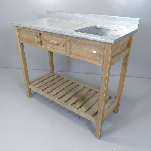 2610 - A modern zinc top two-tier potting table on pine frame. 100x90x45cm