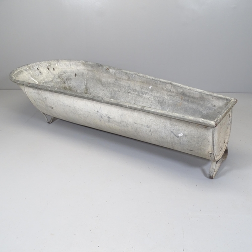 2612 - A galvanised metal trough. 173x28x67cm