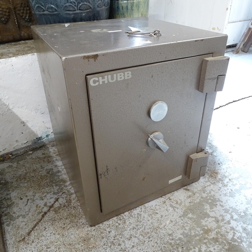 2616 - A modern Chubb floor safe. 53x63x60cm With key.