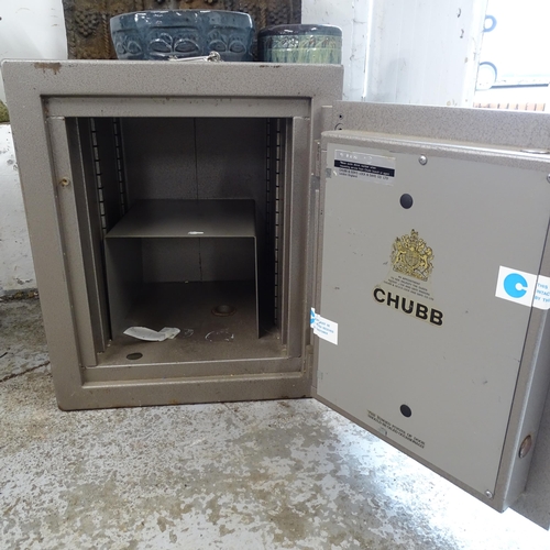 2616 - A modern Chubb floor safe. 53x63x60cm With key.