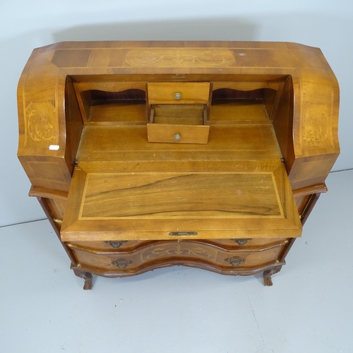 2624 - A French walnut bureau, with inlaid decoration, the fall-front revealing a fitted interior with thre... 