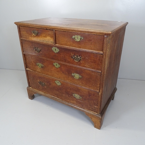 2627 - A Georgian oak chest of two short and three long drawers, raised on bracket feet. 97x92x54cm